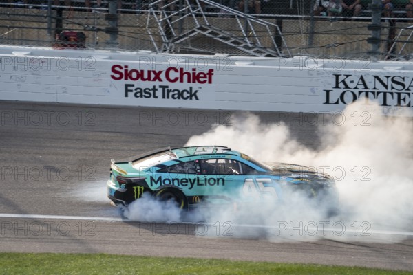 NASCAR Cup Series Driver Tyler Reddick (45) celebrates his win for the Hollywood Casino 400 at the Kansas Speedway in Kansas City KS