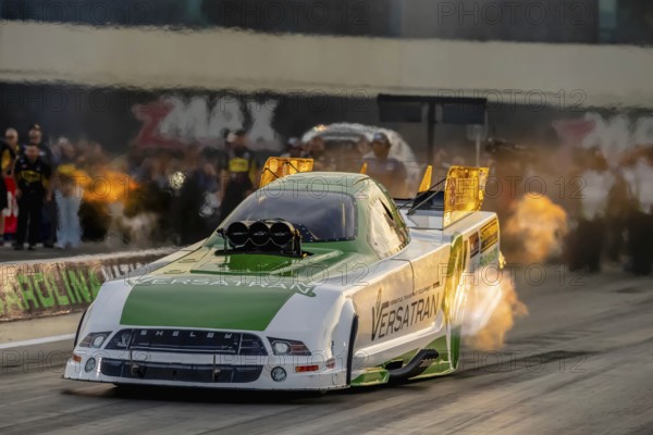 Sep 22, 2023-Concord, NC: NHRA Funny Car Series driver, Dave Richards, runs down the lane during a qualifying session for the Betway Carolina Nationals