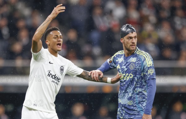 Football, Europa League, round of 16 second leg, 2024/2025, Eintracht Frankfurt vs. Ajax Amsterdam, 13/03/2025, Frankfurt Stadion, Frankfurt, Germany, TUTA (Eintracht Frankfurt, 35) in duel with Daniele RUGANI (Ajax Amsterdam, 24) with bathing cap, Europe