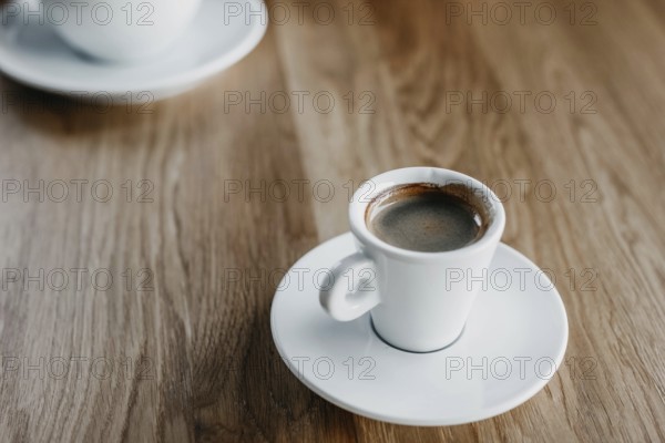Espresso cup on a wooden surface