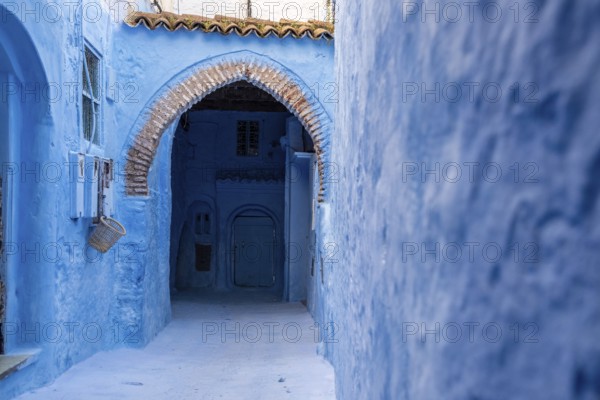 Vibrant blue colored alley in downtown Chefchaouen, Morocco, Africa