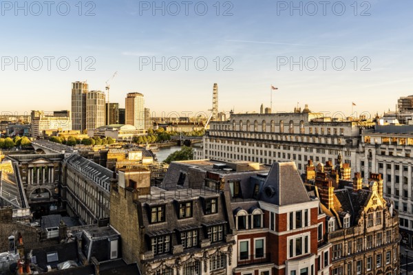 Cityscape of the City of London. High angle view a sunny day at sunset