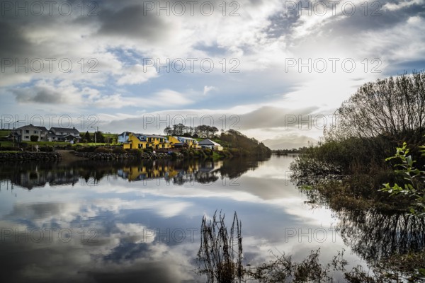 Beautiful reflections on river at morning in Killorglin in the wild atlantic way of Ireland