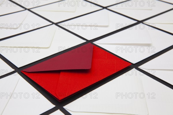 Composition with white and colored envelopes on the table. The photo suitable for various holidays and anniversaries