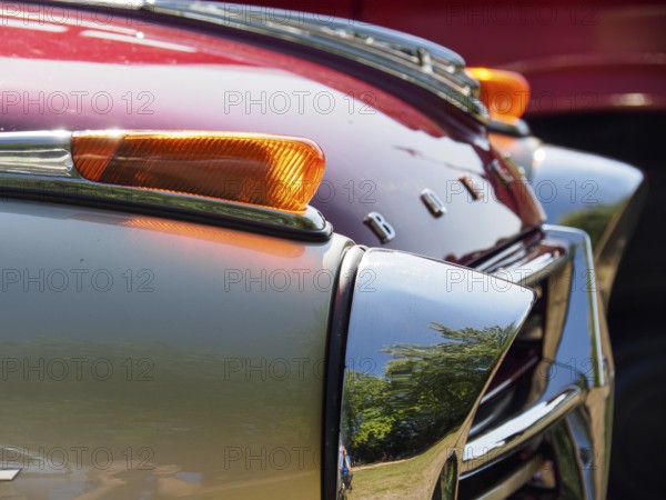 Detailed view of a vintage car with red paintwork and chrome accents, Bocholt, Münsterland, Germany, Europe