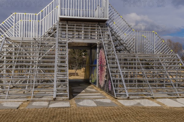 Daejeon, South Korea, January 28, 2020: Large metal observation tower with flowers on inside wall located at Yurim park. Artist unknown, Asia