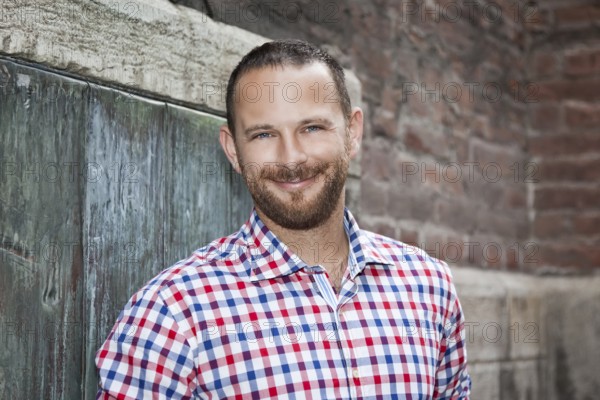 An image of a handsome man with a beard