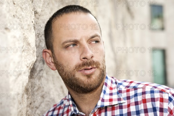 An image of a handsome man with a beard