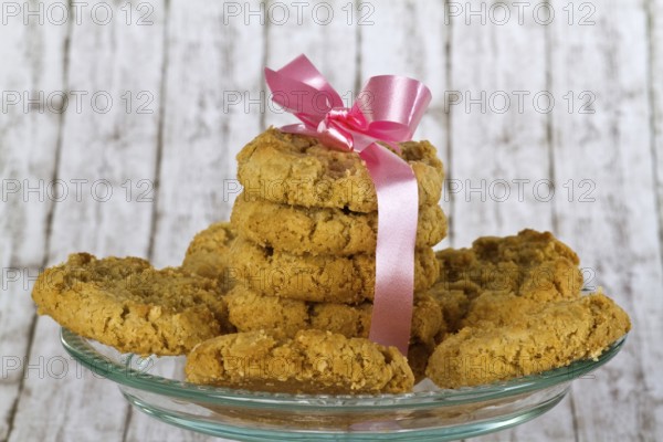 Delicious biscuits on a decorative background