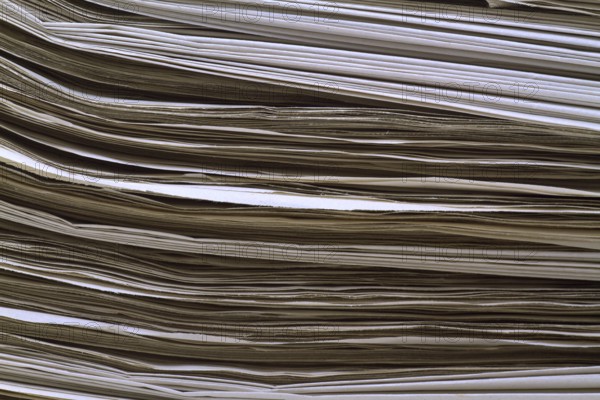 Background made from stacked newspaper