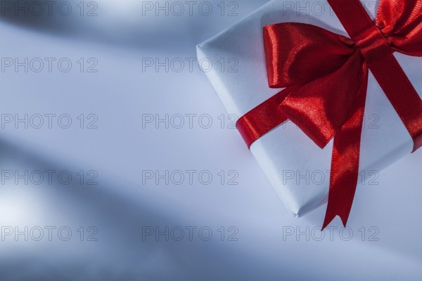 Wrapped red gift box on white background