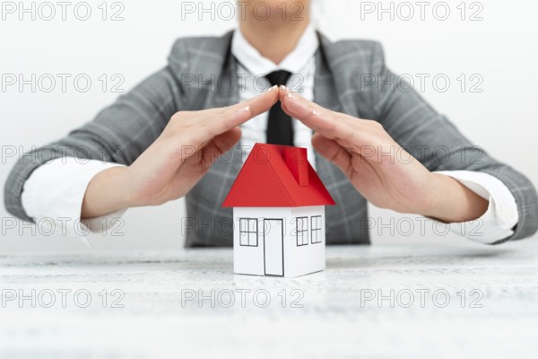 Lady Presenting New Home Insurance Deals In Outfit, Business Woman Showing Possible Mortegage Oppurtiunities For New House, Installments Caculated For Recent Apartments Coverage