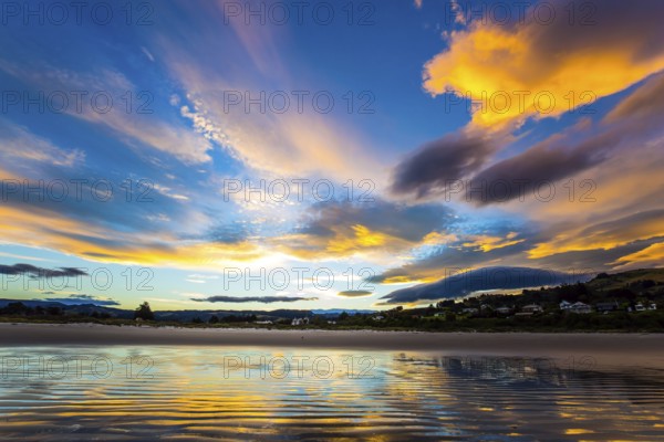 Incredible clouds. The art of artistic photography. Pacific ocean, New Zealand, South Island. Evening twilight, quiet empty beach. Concept photo, eco and healthy tourism, Oceania