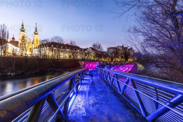 Illuminated Murinsel, Mariahilferkirche in the background, night shot, Graz, Styria, Austria, Europe