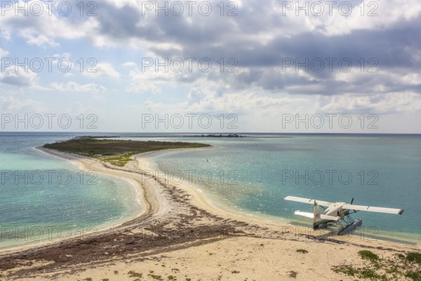 Sea plane docking at Dry Tortugas.Dry Tortugas, is the National Park, less visited of the United States because it is located 70 miles from Key West in Florida and can be reached by ferry or seaplane