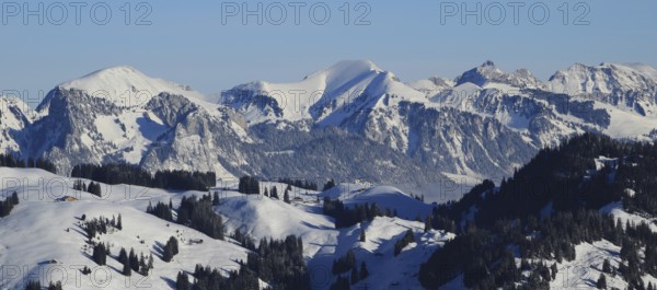 Snow covered mountain ranges seen from Horeneggli