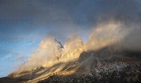 Foggy mountain landscape of the picturesque Dolomiti at Passo Sella area in South Tyrol in Italy