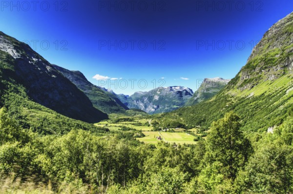Impressive nature on the pass road to Geiranger in Norway in the summertime. On the road through the mountains to Geiranger in Norway in the summertime