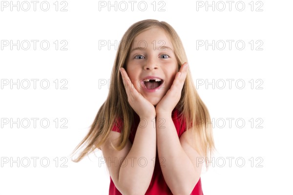 Blond indented kid girl surprised gesture hands in face on white background
