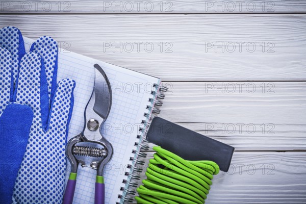 Soft twist tie protective gloves copybook secateurs gardening concept