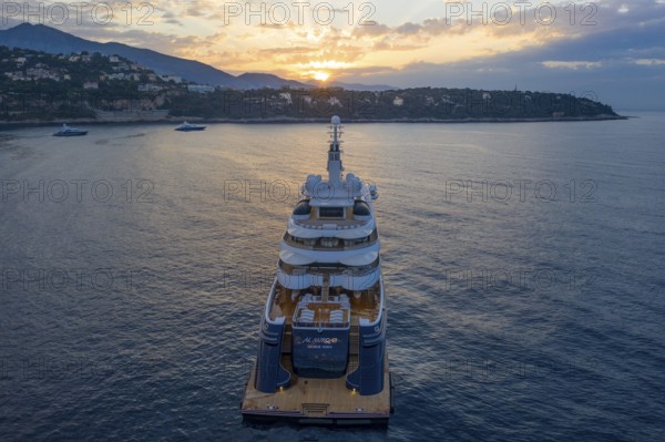Aerial view of 133 metre motor yacht AL MIRQAB, delivered in 2008 by the German shipyard Kusch Yachts, Peters Schiffbau to Sheikh Hamad bin Jassim bin Jaber bin Muhammad Al Thani, member of the royal family of Qatar, designer Tim Heywood, early in the morning at anchor off the Principality of Monaco, Cote d'Azur, Mediterranean Sea