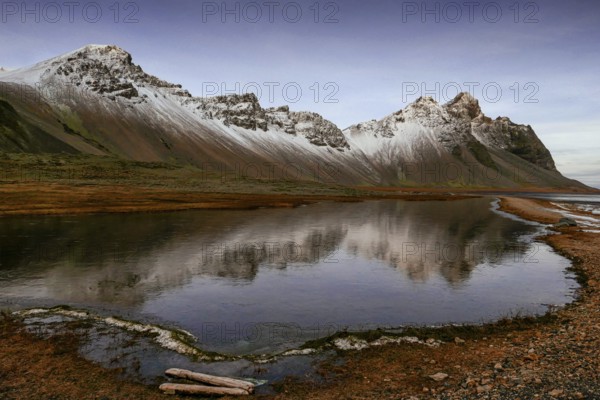 Vestrahorn mountain range and Stokksnes beach panorama, near Hofn, Iceland. Vatnajokull National Park