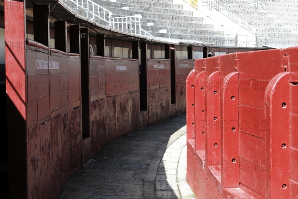 Madrid, Spain, Europe, Narrow entrances in the arena with red walls and names of the areas, Las Ventas Bullring, Europe