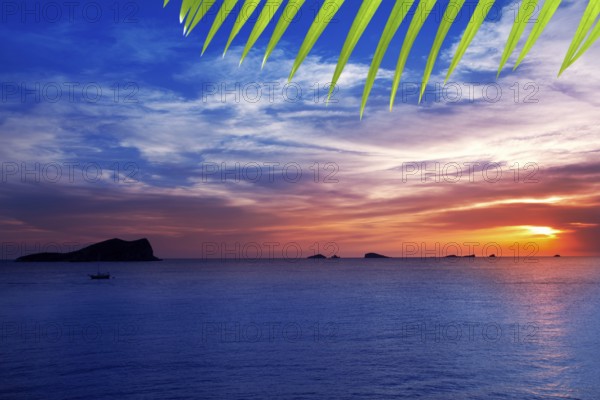 Ibiza cala Conta Conmte sunset with bledas and esparto islands