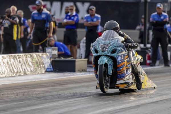 Sep 22, 2023-Concord, NC: NHRA Pro Stock Motorcycles Series driver, Jerry Savoie, runs down the lane during a qualifying session for the Betway Carolina Nationals