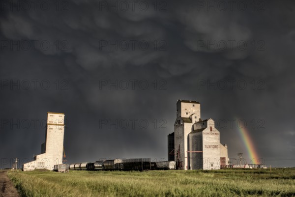 Prairie Grain Elevator in Saskatchewan Canada with storm clouds