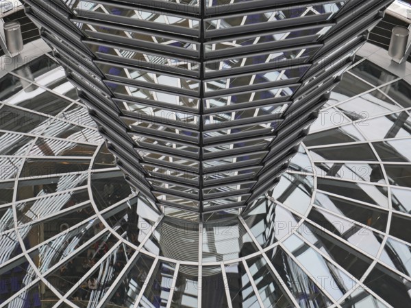Reflections in glass and metal in the dome of the Reichstag. Berlin, Germany, Europe