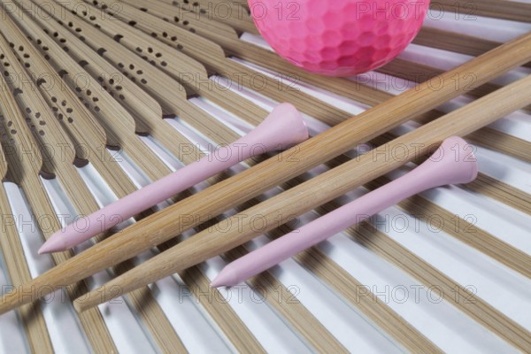 Typical Japanese hand fan made of bamboo, chopsticks and golf equipments
