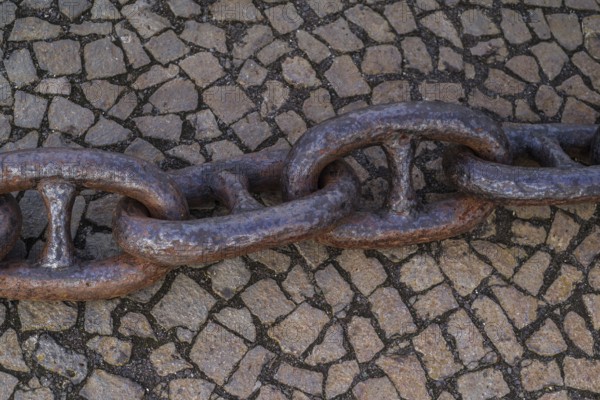 Old, rusty harbour chain