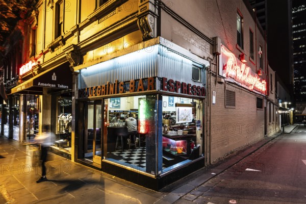 MELBOURNE, AUSTRALIA - OCTOBER 10, 2024: Melbourne's Pellegrini's Espresso Bar at night on October 10th, 2024