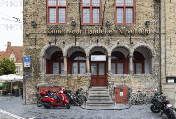 Veurne, West Flanders Region, Belgium, 07 18 2021 Facade of the Chamber of commerce at the old market square, Europe