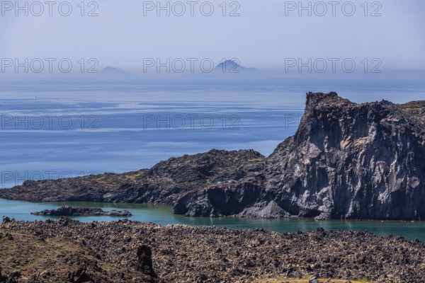 View from the volcanic island of Nea Kameni to the volcanic island of Palea Kameni, Archipelago of Santorini, Cyclades, Greece, Europe