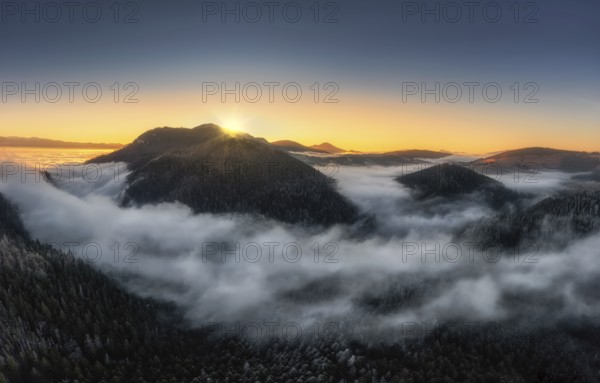 Fog over the Liptov village of Velke Borov before sunrise in Slovakia
