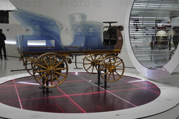 Egger, Lohner C2 Phaeton, Antique blue vehicle with wooden elements on a futuristic exhibition platform, New Porsche Museum 2009, Stuttgart, Baden-Württemberg, Germany, Europe