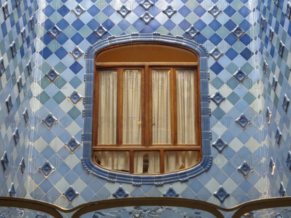 Window in the staircase of Casa Batllo, Barcelona, Catalonia, Spain, Europe