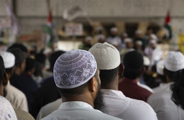 07 April 2025- Gazipur, Bangladesh: The general public, many of whom are wearing traditional Muslim prayer hats, have gathered for a rally or demonstration in support of the Palestinians