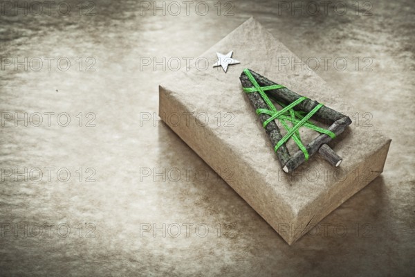 Christmas handmade gift box on vintage paper