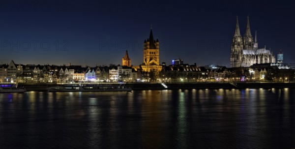 Cityscape of Cologne with old town and cathedral at night