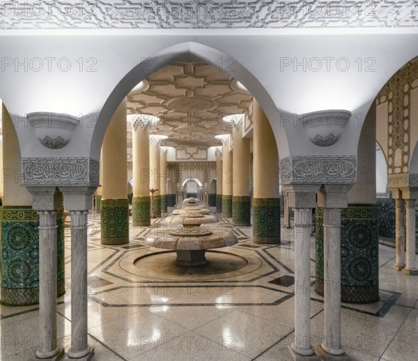 Casablanca, Morocco, 29 March, 2024: marble-carved lotus flower spring fountains in the underground bathhouse of the Hassan II Mosque in Casablanca, Africa
