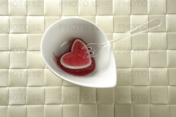 Eat a jelly strawberry bloody heart romantic metaphor