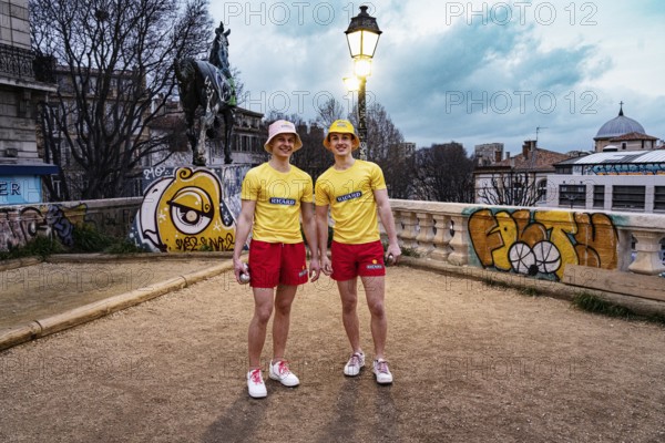 Two men in the same clothes in red and yellow, petanque Carli, advert for Pastis, Marseille, France, Europe