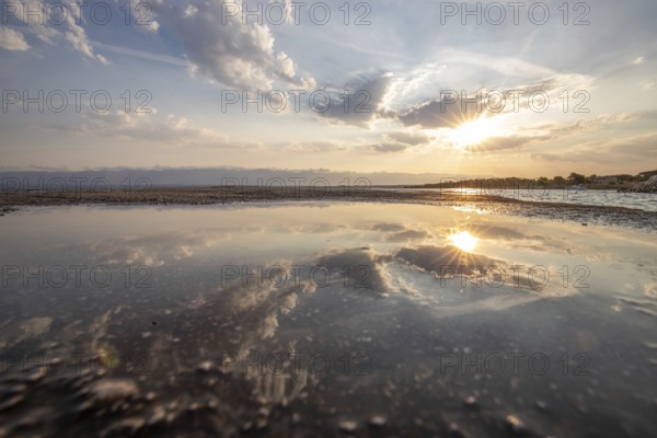 Bay with a small jetty or pier in the morning. Beautiful sunrise on the Mediterranean. Mediterranean coast and landscape beach Plaža Loziceder. Island of Vir, Zadar, Dalmatia, Adriatic Sea, Croatia, Europe
