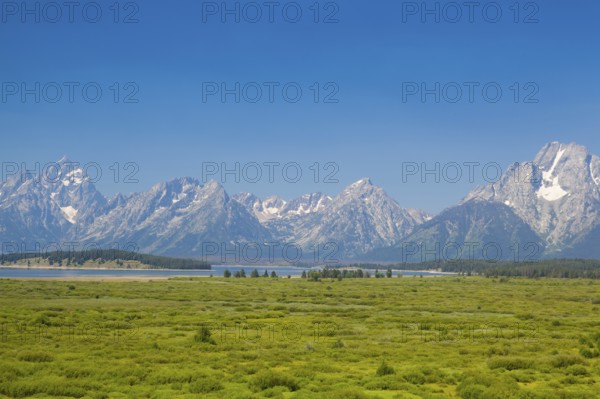 The amazing Teton mountains above Jackson Lake in Wyoming, USA, North America