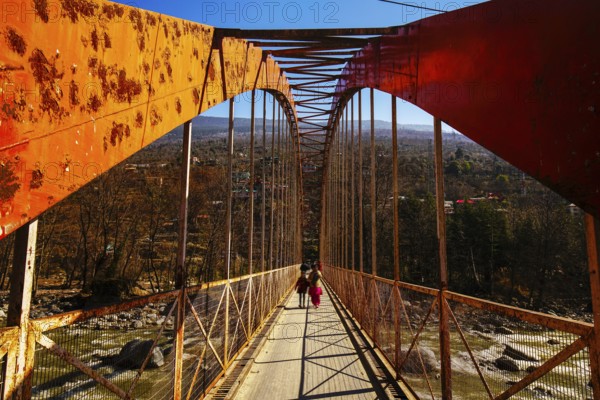Small pedestrian bridhe through Beas river, but I see small car cross this bridge!Himachal Pradesh. Mountain region- Hymalayas, sunny day!