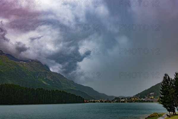 Panoramic View over City and Lake Sankt Moritz and Mountain Valley with Beautiful Storm Clouds in a Summer Day in St Moritz, Grisons, Switzerland, Europe