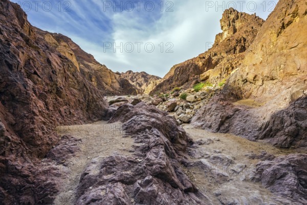 Israel in January. The picturesque Black canyon in ancient Eilat mountains